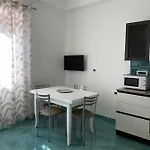 Апартаменти Casa Ausilia Trilocale *