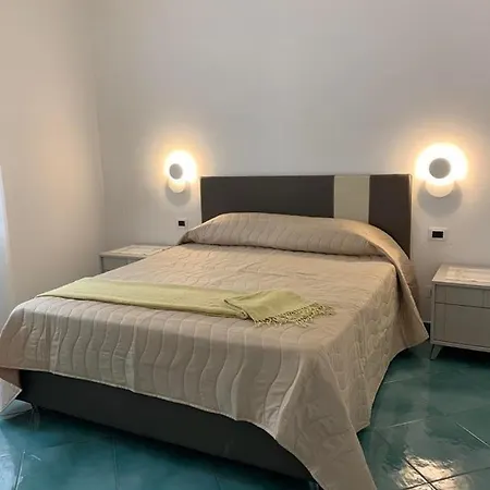Апартаменти Casa Ausilia Trilocale *